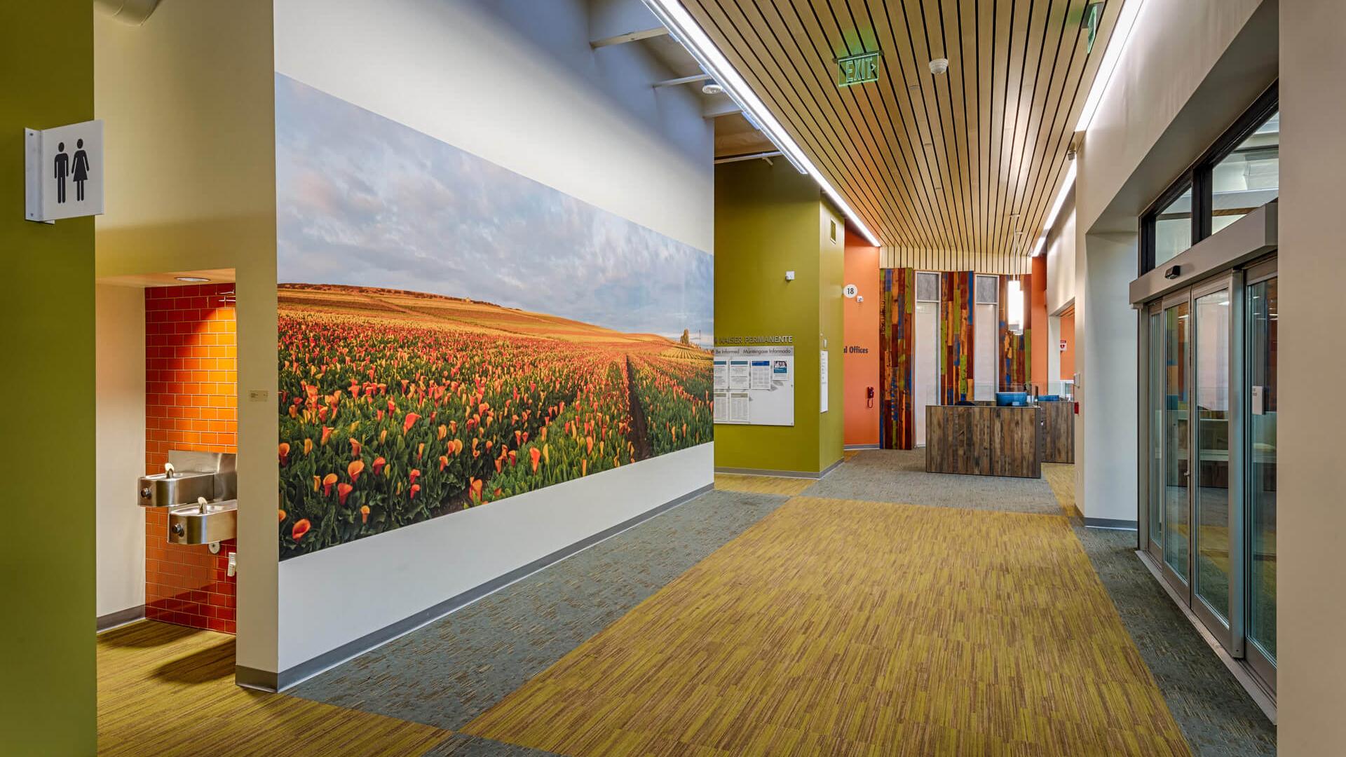 Entry lobby graphic artwork -Local artist photograph of Cala Lily fields against a foggy coastal sky