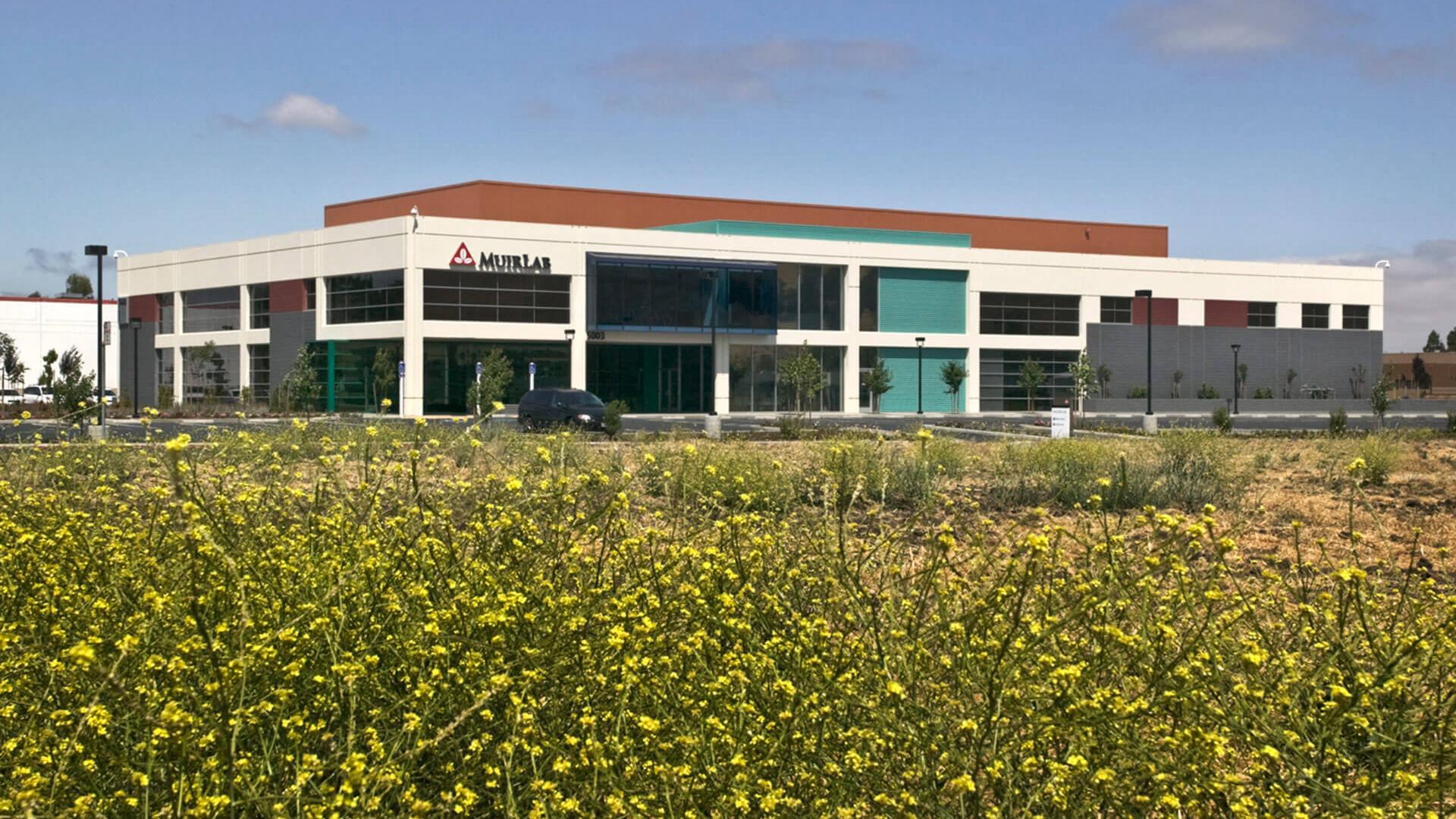 Muir Core Lab view thru flower field