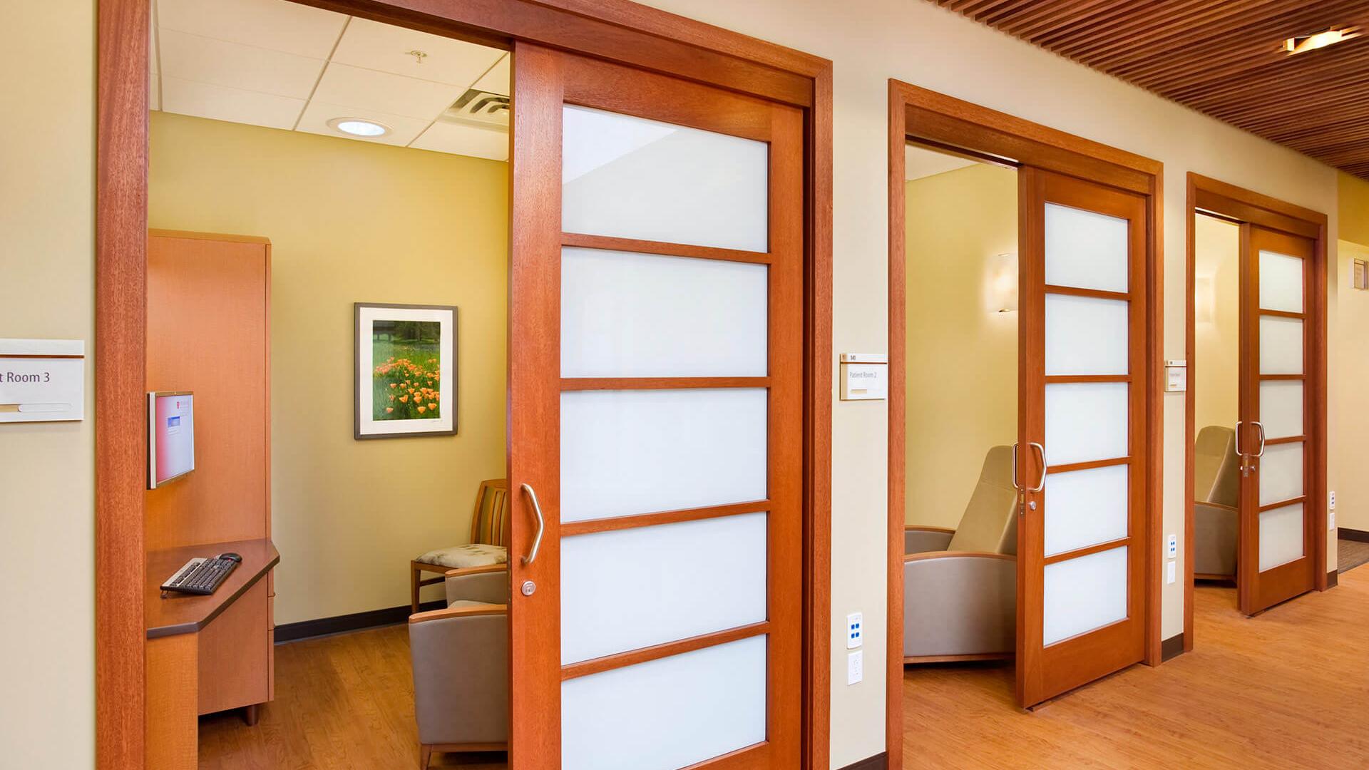 patient exam corridor with warm wood
