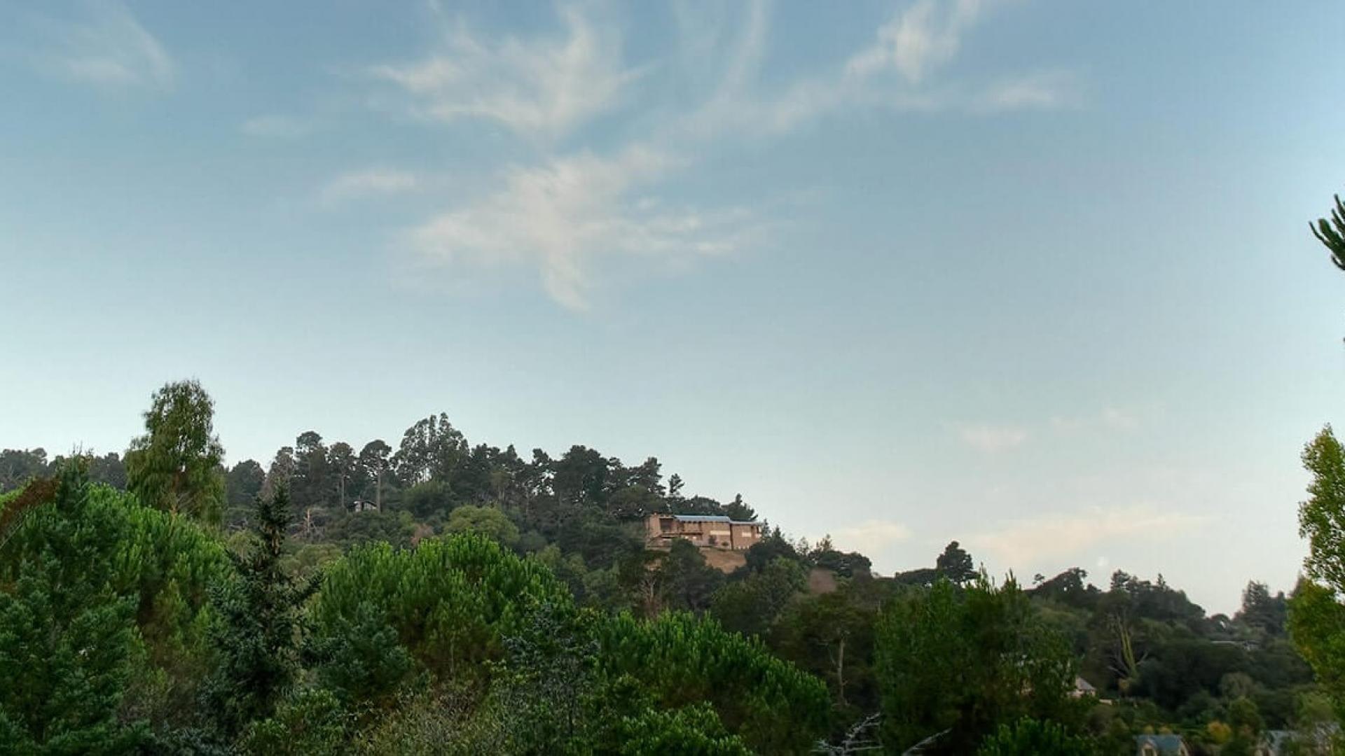 home nestled into the hillside