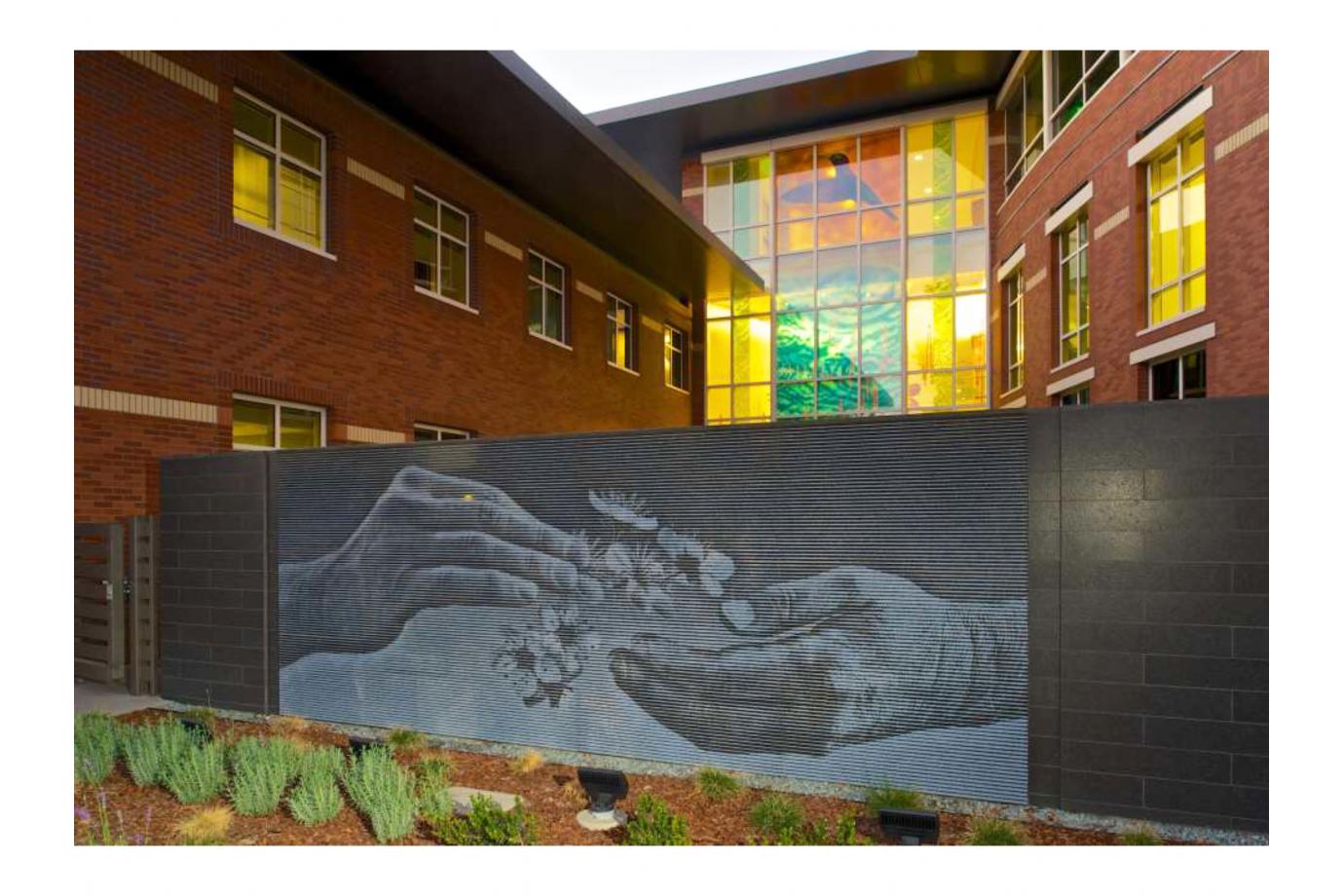 Healing Hands art wall outside of Cancer Center